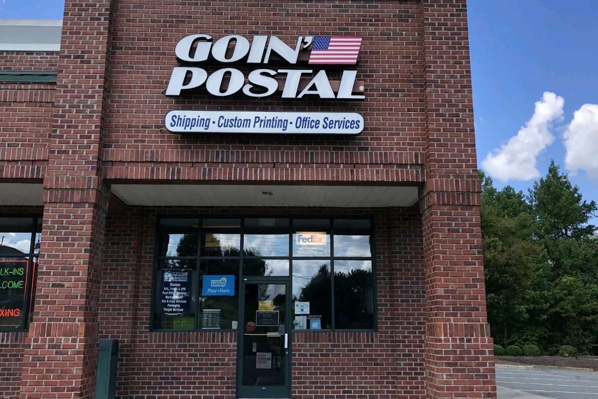 Exterior of Goin' Postal Whitsett shipping center in Whitsett, NC